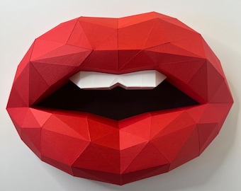 以下が含まれることがあります： 白い紙の笑顔をした赤い紙の唇、3Dの紙工芸です。