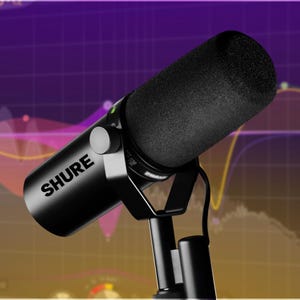 May include: A black Shure microphone on a stand, angled slightly to the left. The microphone has a dark, textured head and the brand name is visible. The background features a purple and yellow graphic.