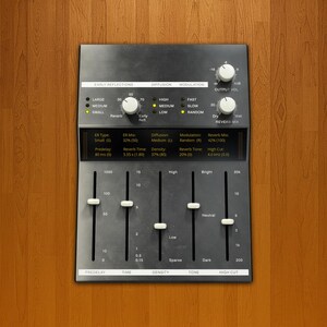 May include: A dark grey audio effects panel featuring knobs, sliders, and a digital display. The panel is labelled with terms such as "Early Reflections", "Diffusion", and "Modulation". The sliders are marked with values. It rests on a wooden surface.