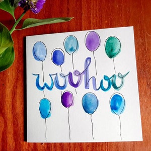 Tarjeta de celebración con acuarela pintada a mano, globos "woohoo", 4 colores disponibles, perfecta para cumpleaños, graduación, tarjeta de felicitaciones
