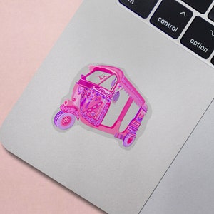 May include: A pink and purple auto rickshaw with intricate floral designs. The rickshaw is a popular mode of transportation in many parts of Asia.
