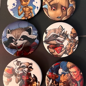 May include: Six round buttons featuring characters from the Guardians of the Galaxy movie. The buttons feature Rocket Raccoon, Groot, and Star-Lord.