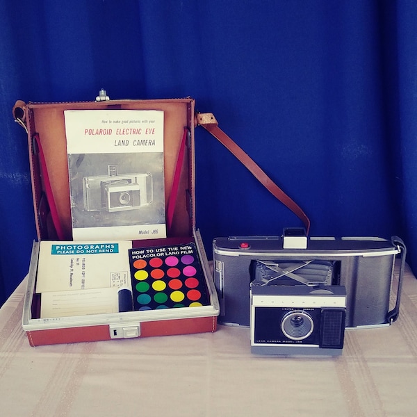 Vintage Polaroid Electric Eye Land Camera Model J-66 in Original Leather Case and Instructions.