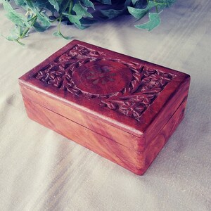 Vintage hand carved wood jewelry or trinket box.