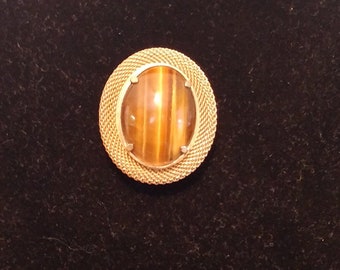 Vintage Tiger's Eye Brooch with braided faux gold setting.