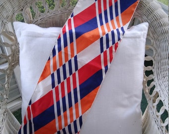 Vintage Scarf with colorful geometric pattern of blue, orange, red, and white.  Long and narrow. Perfect condition.