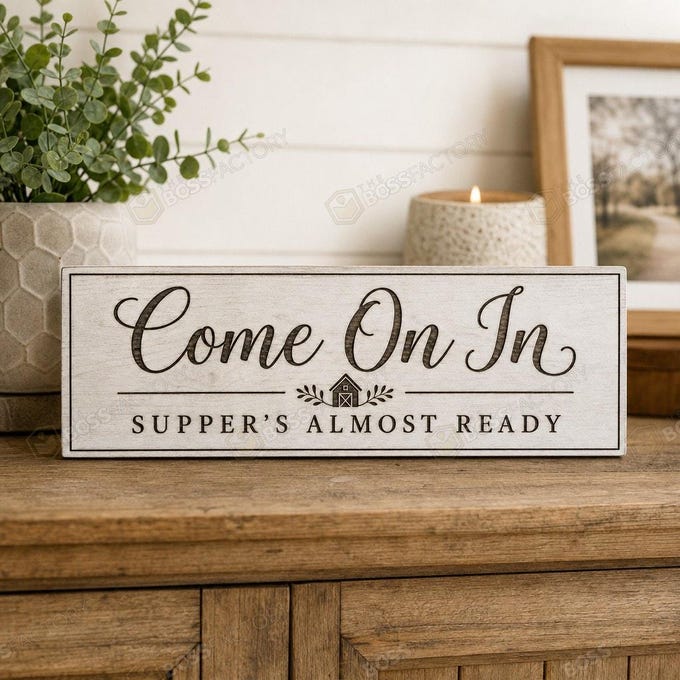 Laser-engraved solid pine farmhouse kitchen sign in Linen White stain option reading Come On In Supper’s Almost Ready.