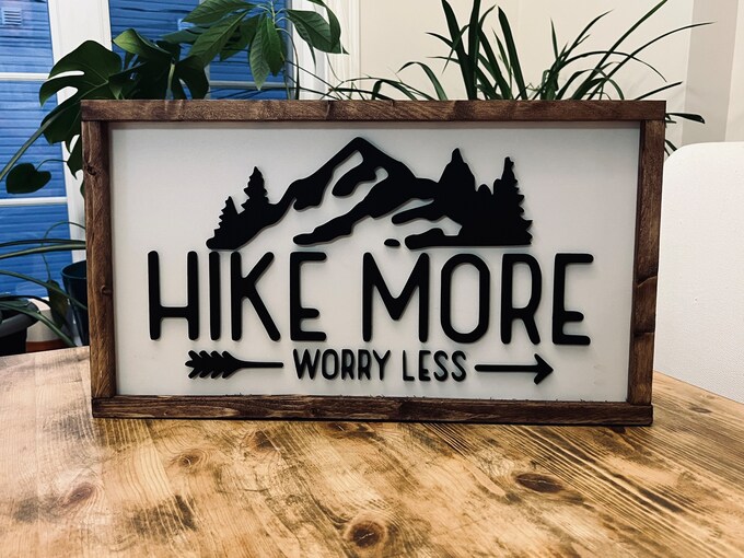 Hike More Worry Less 3D raised-lettering wood sign with a mountain relief