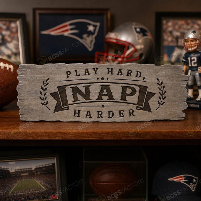 Laser-engraved wood sign featuring the phrase 'Play Hard, Nap Harder' in weathered grey stain, perfect for sports enthusiasts.