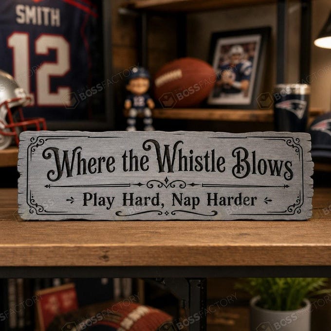 Laser-engraved sports team sign with phrases 'Where the Whistle Blows' and 'Play Hard, Nap Harder' in weathered grey.
