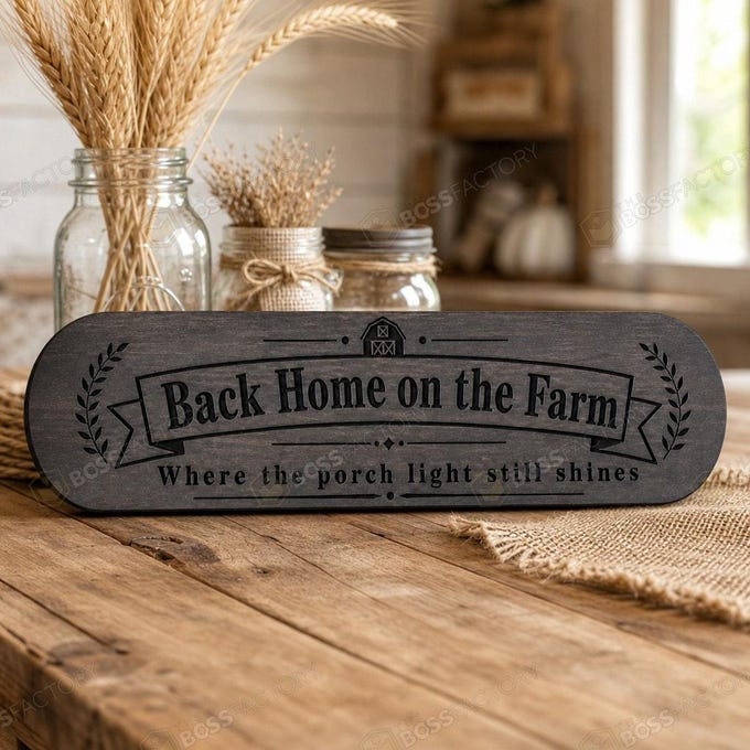 Laser-engraved solid pine farm sign reading “Back Home on the Farm” and “Where the porch light still shines,” shown with a dark Ebony stain option.