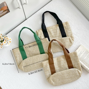 May include: Three woven tote bags with different colored handles. The bags are beige with green, black, and brown handles. The largest bag measures 11.8 inches (30 cm) wide and 6.2 inches (16 cm) high.