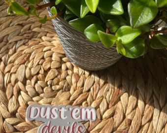 Dust em devils sticker