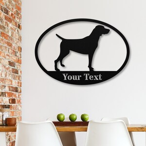 May include: Black metal silhouette of a dog in an oval frame with the text "Your Text" below.
