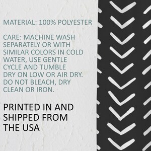 May include: A section of fabric with a black and white chevron pattern. The text on the left side reads "MATERIAL: 100% POLYESTER" and care instructions. The fabric is printed in the USA.