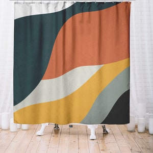 May include: Abstract shower curtain with a design of wavy lines in shades of teal, orange, yellow, and white.