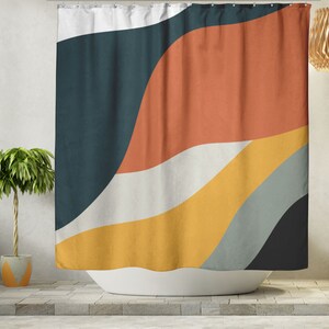 May include: Abstract shower curtain with a design of curved lines in shades of teal, orange, yellow, white, and gray.