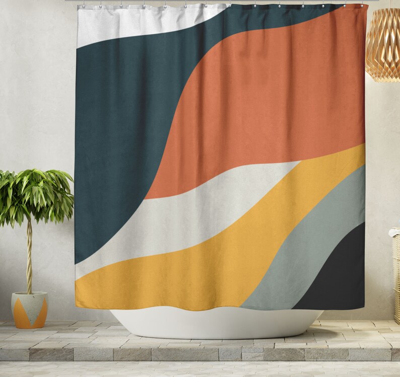 May include: Abstract shower curtain with a design of curved lines in shades of teal, orange, yellow, white, and gray.