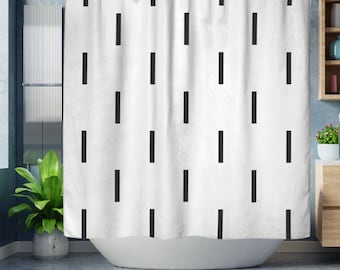 May include: White shower curtain with a black vertical line pattern.