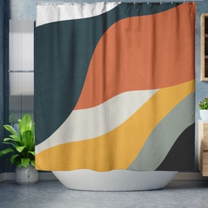 May include: Abstract geometric shower curtain with a design of curved lines in shades of teal, orange, yellow, white, and gray.
