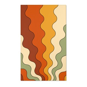 Op de afbeelding: Abstracte digitale kunstprint met golvende lijnen in tinten van oranje, geel, bruin en groen.