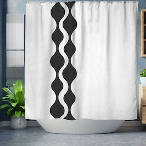 May include: White shower curtain with a black wavy pattern down the left side. The pattern is made up of a series of connected ovals.