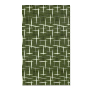 May include: A green fabric with a white geometric pattern of intersecting lines.