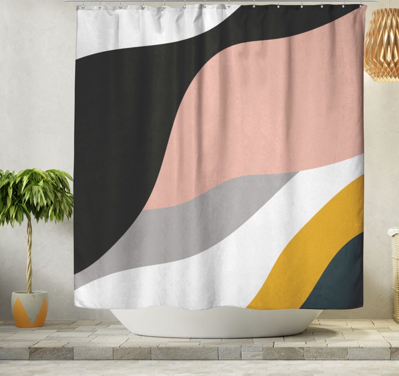 May include: Abstract shower curtain with a design of wavy lines in black, pink, gray, white, and yellow.