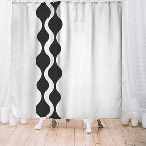 May include: White shower curtain with a black and white wavy pattern along the left edge.