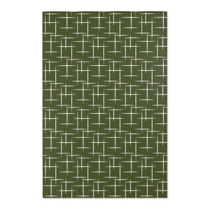 May include: A green fabric with a white geometric pattern of overlapping lines forming a grid.