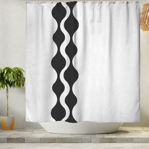 May include: White shower curtain with a black wavy pattern down the centre.