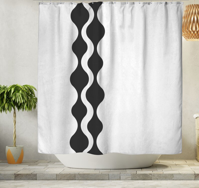 May include: White shower curtain with a black wavy pattern down the centre.
