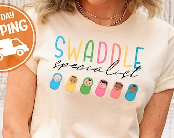Swaddle Specialist Labor And Delivery Shirt, NICU Nurse Shirt, Mother Baby Unit Shirt, Postpartum Nurse Shirt, Nursery Nurse Tee, Nurse Life