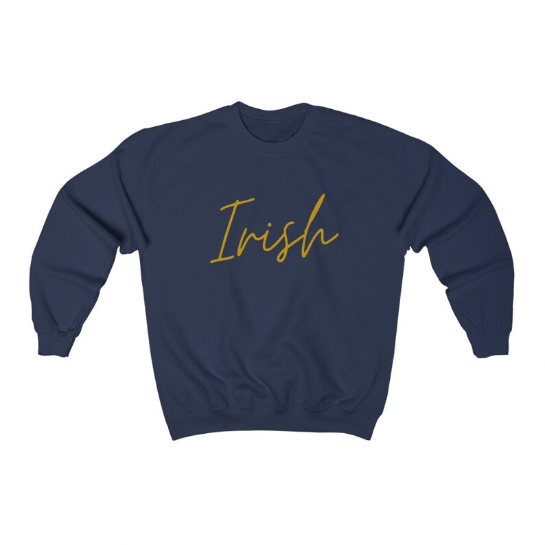 May include: Navy blue sweatshirt with the word "Irish" written in gold script.