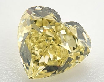 GIA 0.82ct Natural Fancy Yellow Heart Diamond