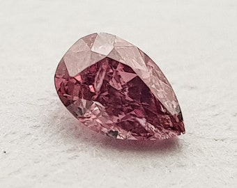 0.06 ct - Pear - natural fancy deep pink diamond