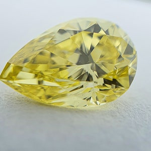GIA 0.58ct Natural Fancy Vivid Yellow Pear Diamond