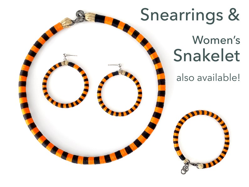 Puede incluir: Collar, pendientes y pulsera a rayas naranja y negro. El texto "Snearrings & Women's Snakelet also available!" es visible en la imagen.