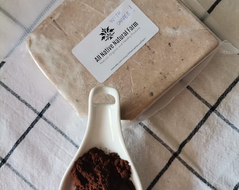 Puede incluir: Un bloque rectangular blanco de halva con sabor a café envuelto en plástico con una etiqueta que dice "With Coffee! All Native Natural Farm Natural, Organic and Healthy Products www.etsy.com/shop/AllNativeNaturalFarm" y una pequeña cuchara de cerámica blanca llena de café molido.