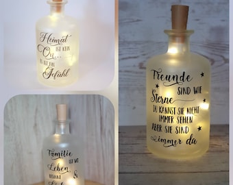 Labeled and illuminated frosted iced apothecary bottle with saying as a gift friends family star light chain cork 700ml