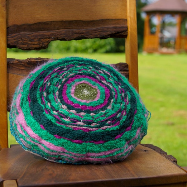 Coussin rond tissé à la main vert