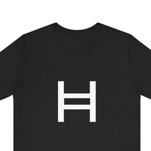 May include: Black t-shirt with a white "H" logo. The "H" is made up of two horizontal lines.