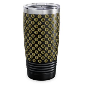 May include: A black stainless steel tumbler with a gold Bitcoin logo pattern. The tumbler has a black lid and a black base.