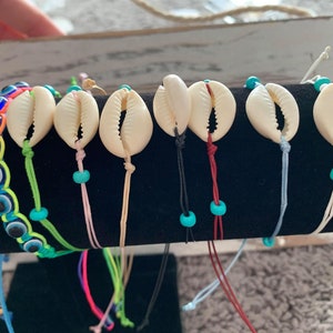 the lucky charm bracelet cowrie shell