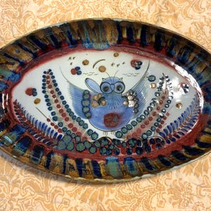 Vintage handmade Mexican pottery platter with owl
