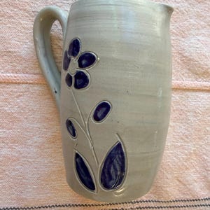 Vintage Williamsburg salt glaze pottery creamer with blue floral design