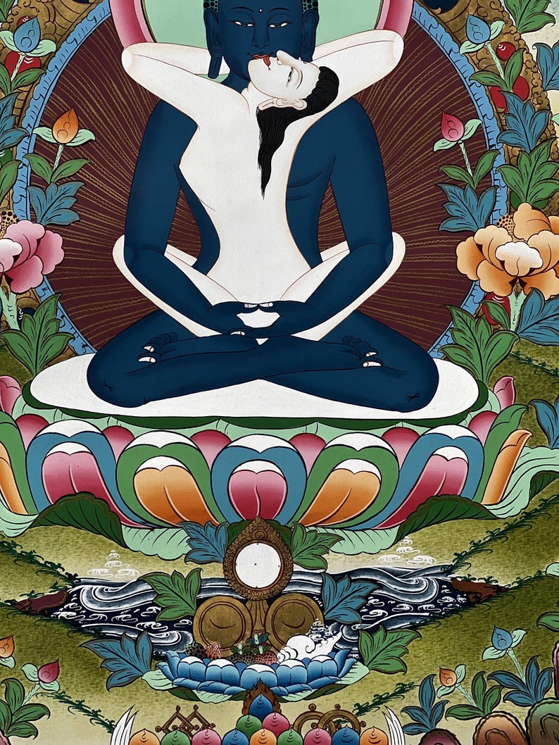 May include: A thangka painting depicting a dark blue deity in a meditative pose embracing a white figure. The figures are seated on a multi-colored lotus pedestal surrounded by floral motifs, with a dark circular halo and intricate green landscape details.