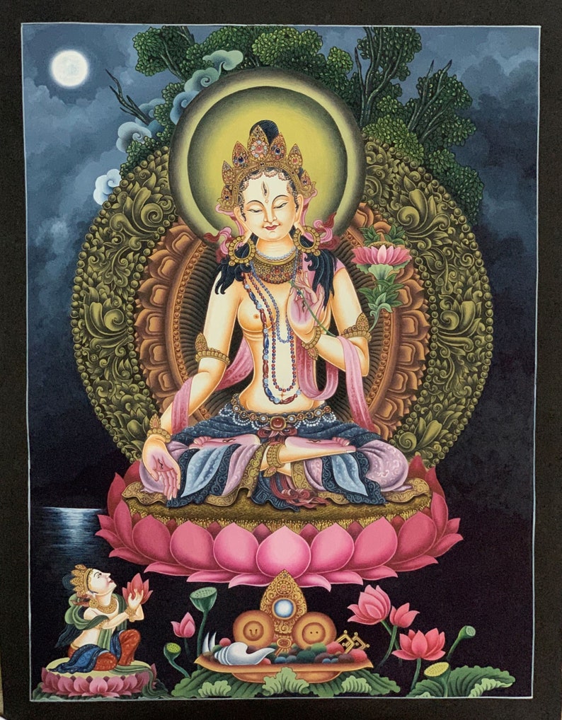 May include: A painting of a deity sitting in a lotus position on a pink lotus flower. The deity is adorned with jewelry and has a serene expression. The background is a dark blue with a moon and clouds.