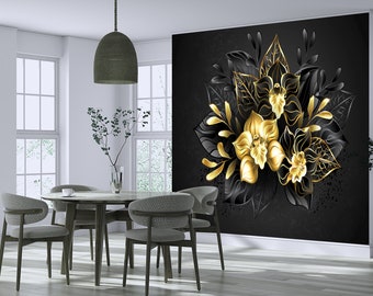 May include: A large wall mural featuring a central arrangement of three golden orchid flowers surrounded by dark black leaves and foliage. The design is set against a solid black background, creating a high-contrast visual display of metallic gold and matte black botanical elements.