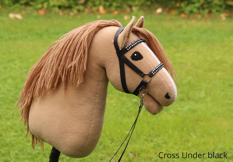 Käpphästträns - Flera varianter och stilar Cross under black